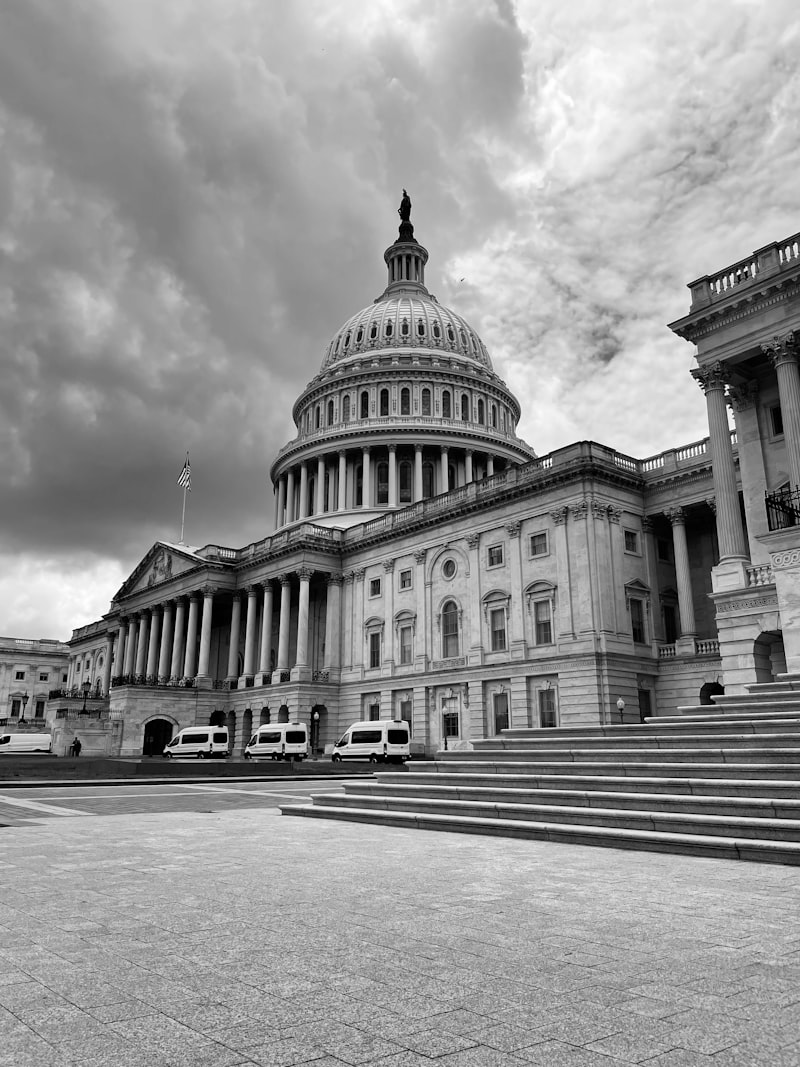 The US Capitol building in Washington DC under cloudy skies