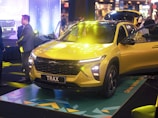 A vibrant Citroën car displayed against a colorful backdrop.