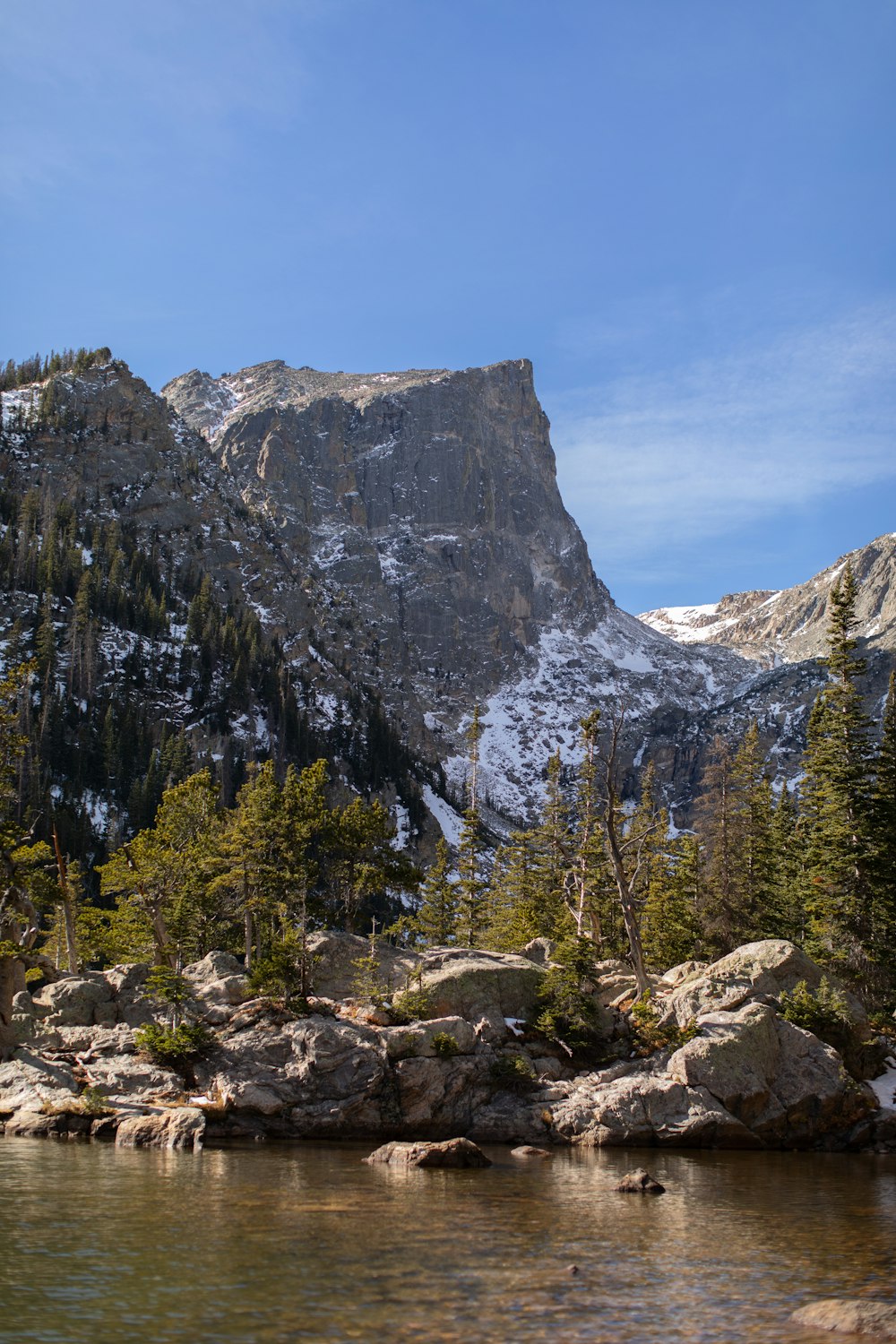 a mountain with a lake in front of it