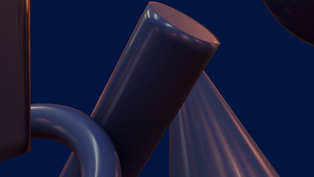 a close up of a metal object with a blue background