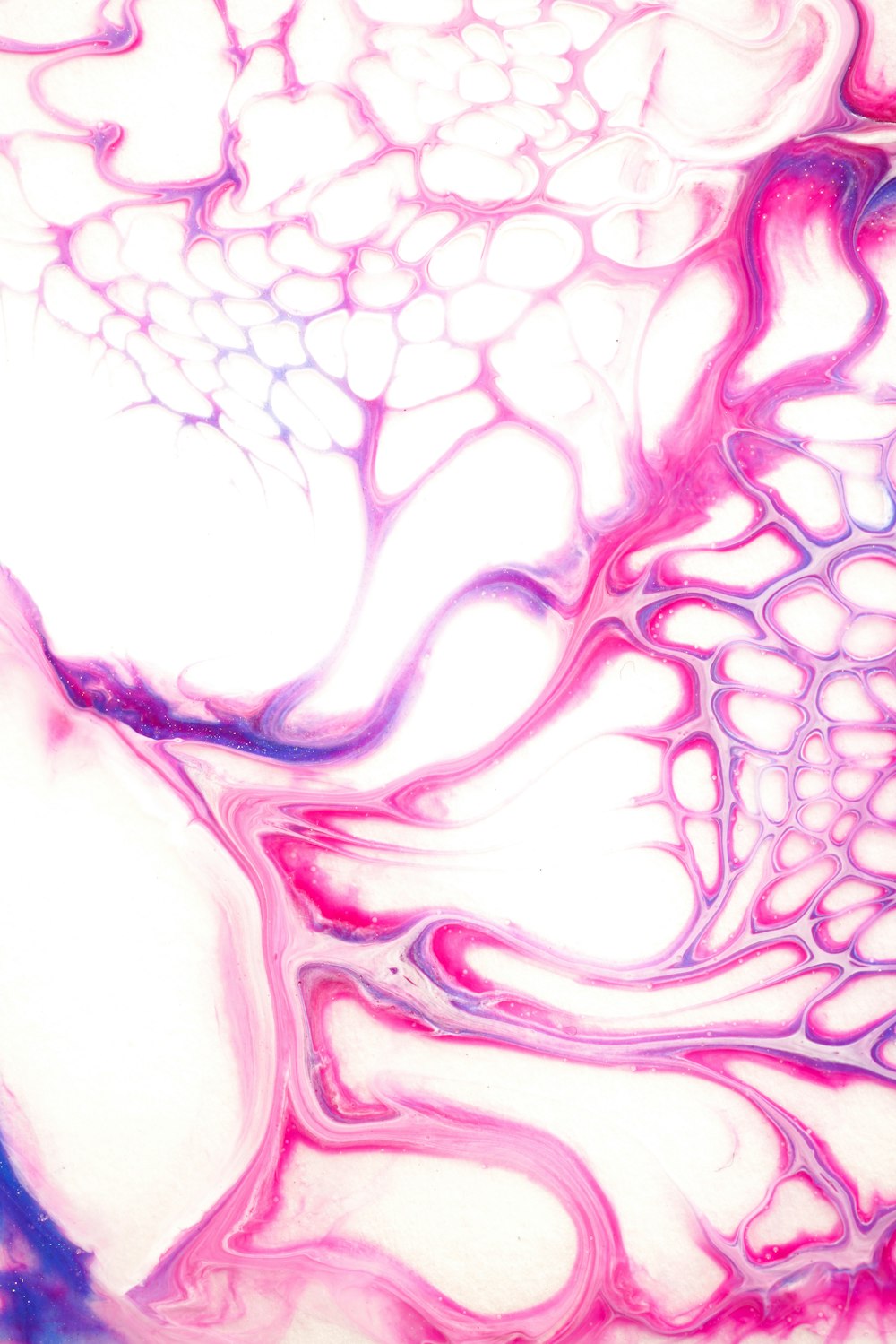 a close up view of a pink and blue substance