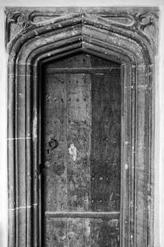 Antique pewter door showcasing timeless craftsmanship and sturdy build.