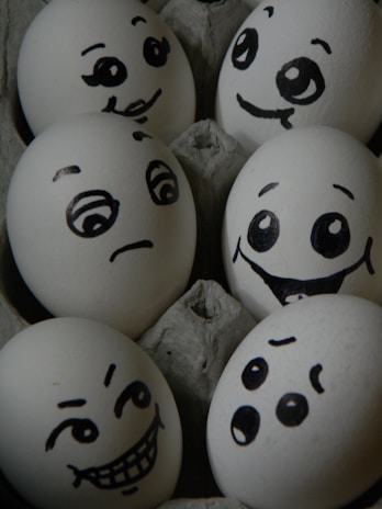 Egg cartons labeled 'Huevos La Felicidad' ready for delivery to local businesses.