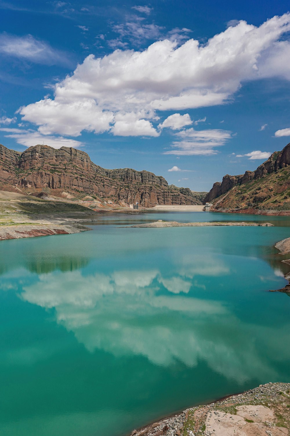 a large body of water surrounded by mountains