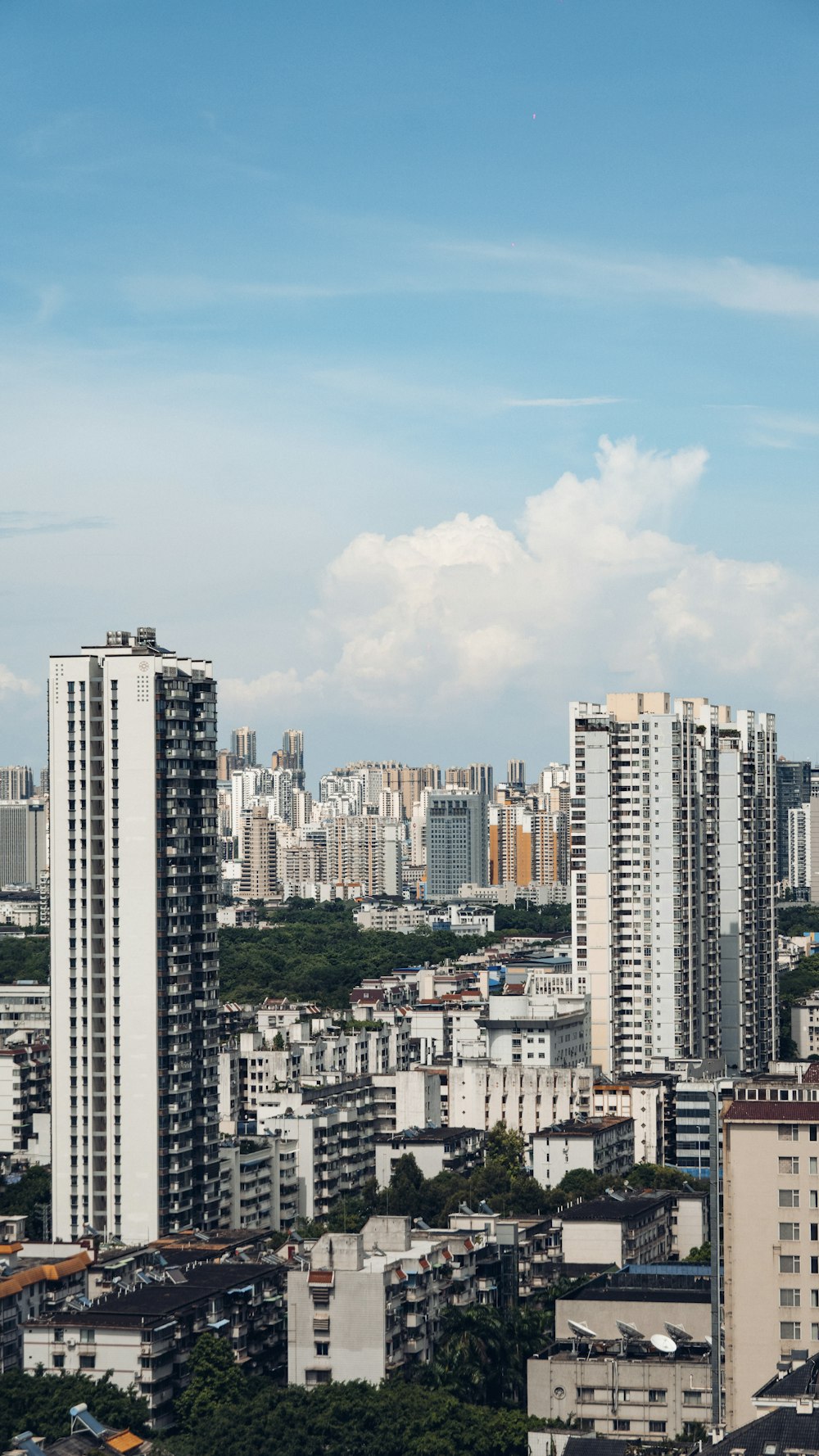 a view of a city with tall buildings