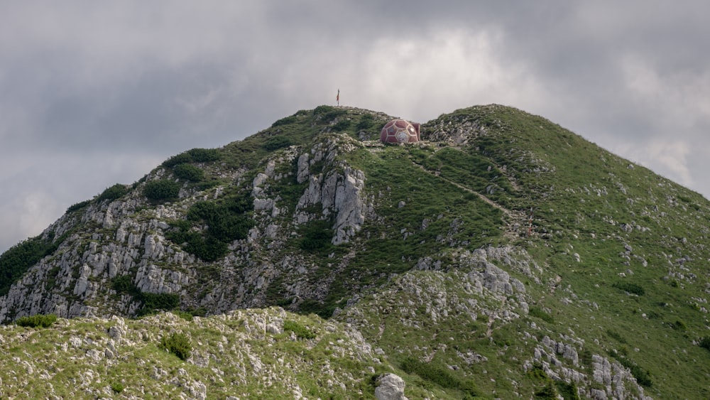 a hill with a house on top of it