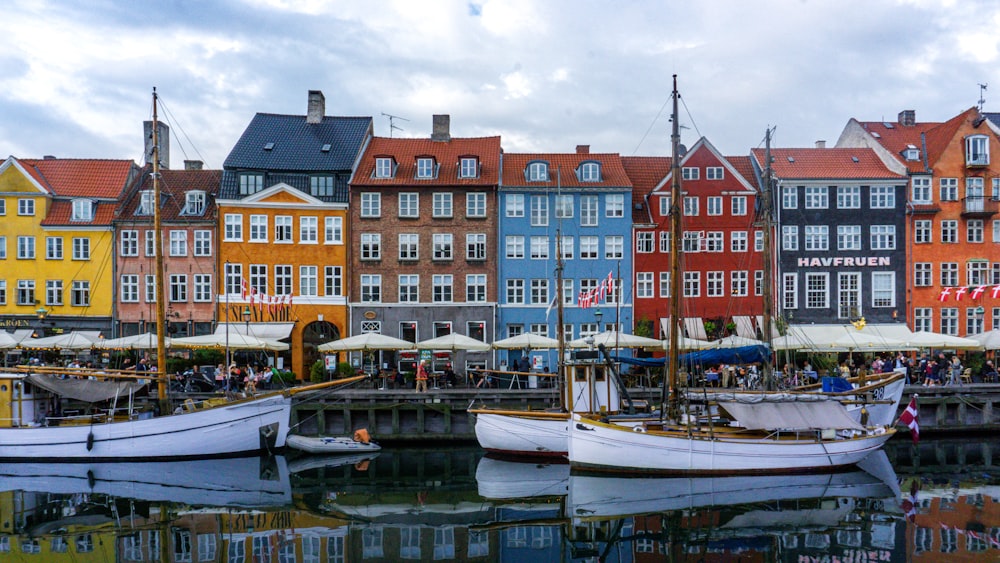 a group of boats that are sitting in the water