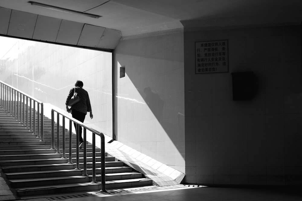 a person walking up a set of stairs