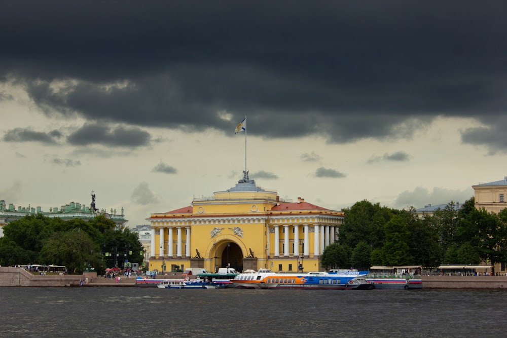 a large building with a flag on top of it