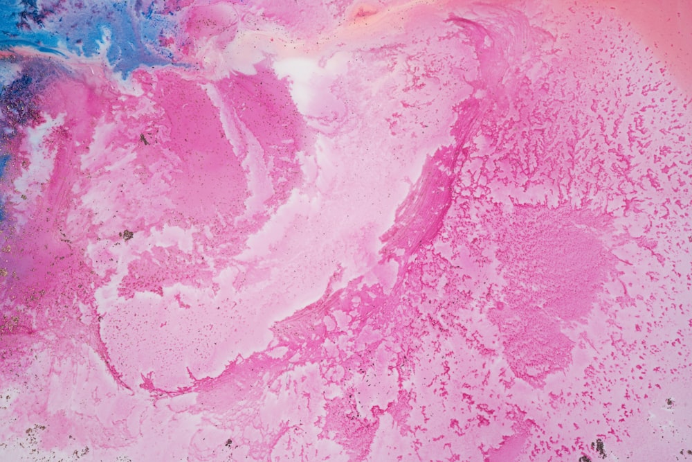 a close up of a pink and blue substance