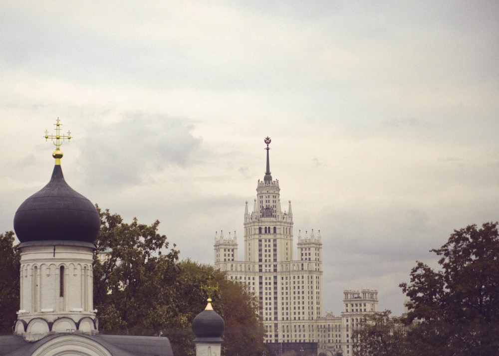 a clock tower in the middle of a city