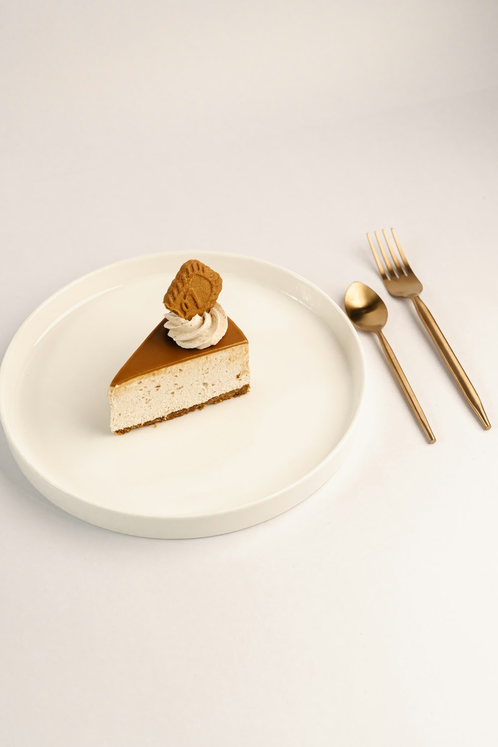 a piece of cake on a plate with a fork