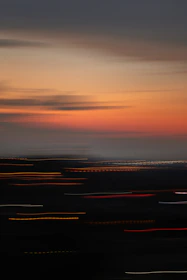 A blurred cityscape at dusk, hinting at vibrant possibilities ahead.