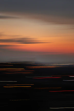 A blurred cityscape at dusk symbolizing the energy behind new projects.