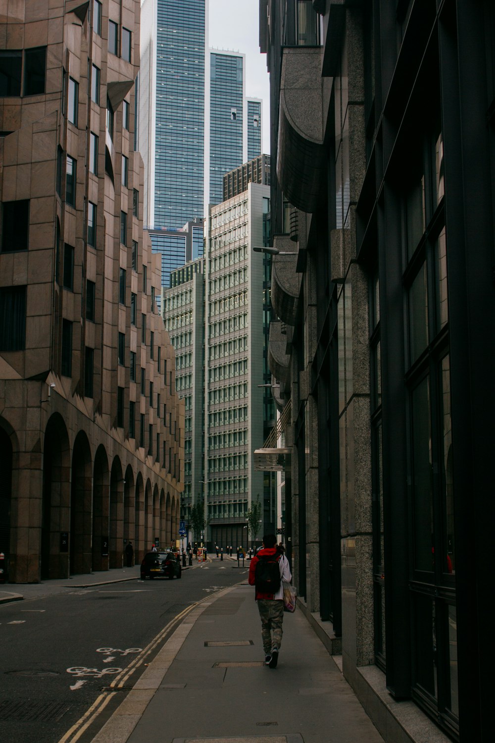 a person is walking down a city street