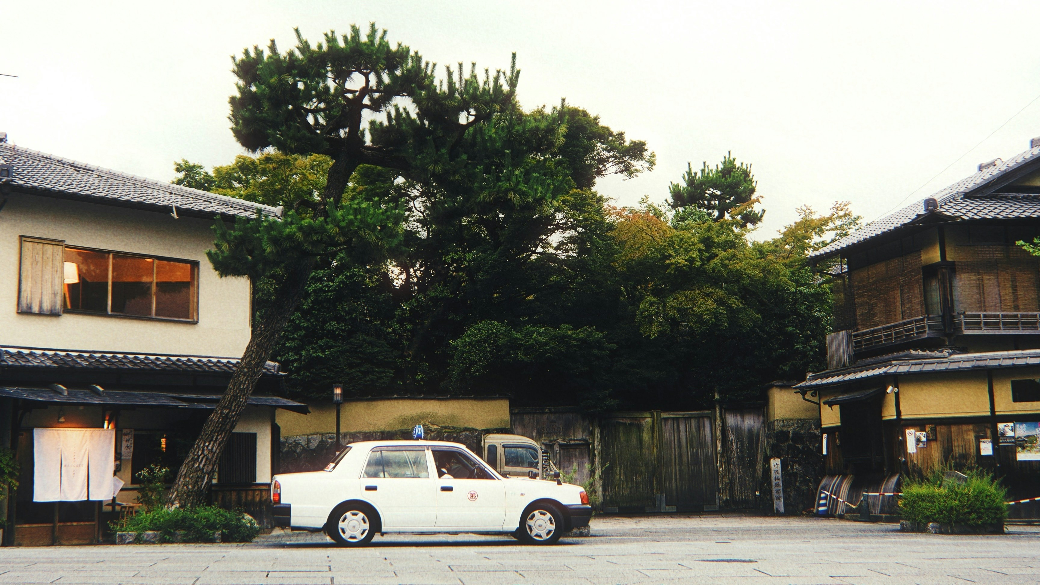 white taxi in kyoto (landscape)