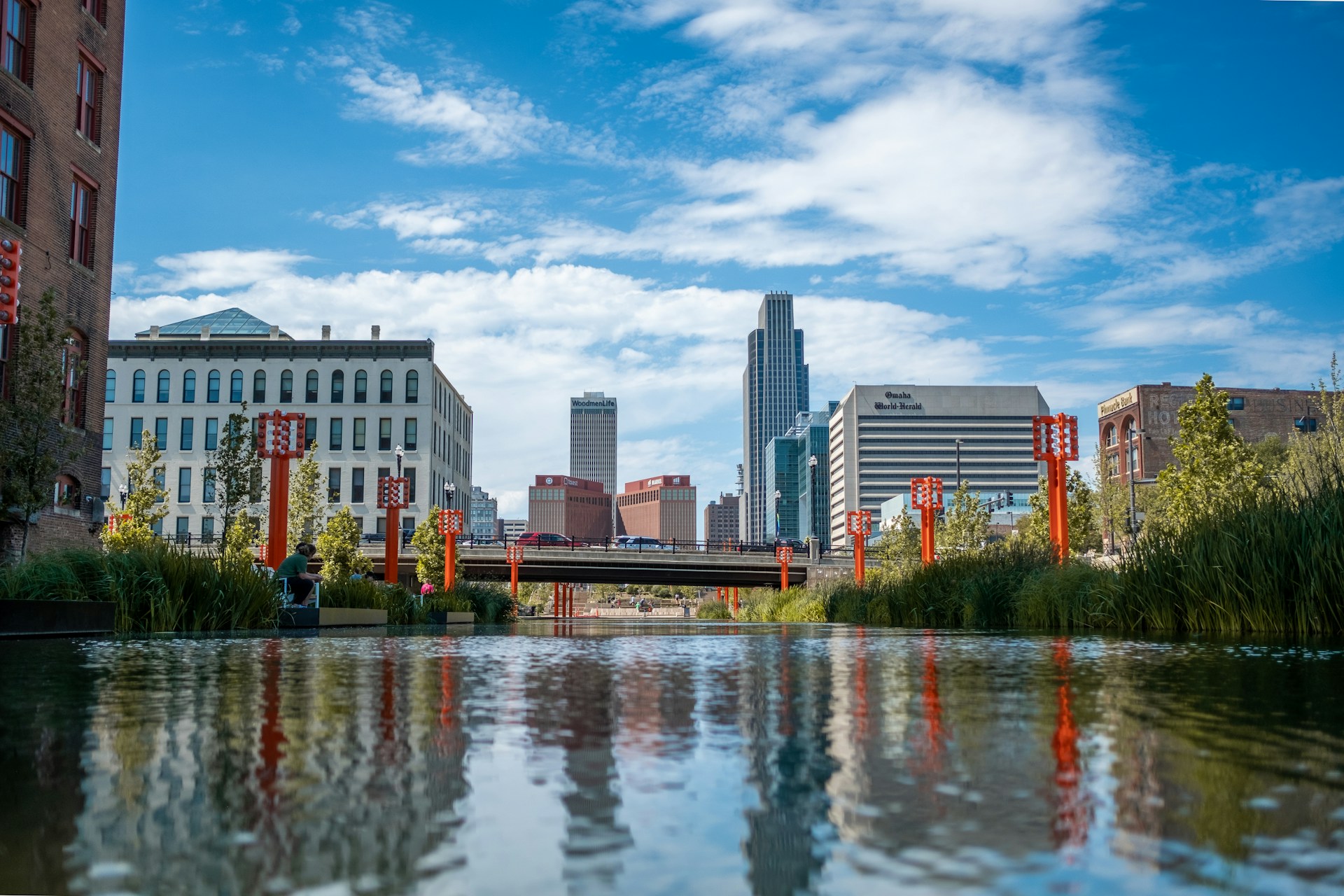 a body of water surrounded by tall buildings