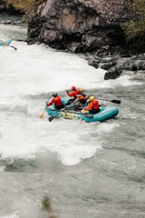 A group of adventurers navigating whitewater rapids in San Gil, Colombia.