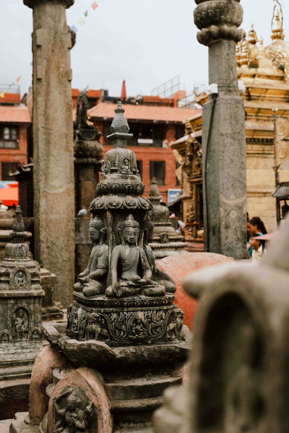 a group of statues sitting next to each other