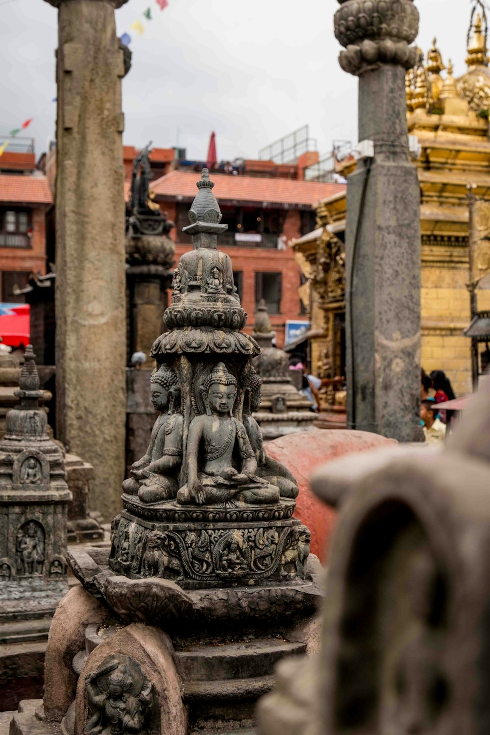 a group of statues sitting next to each other