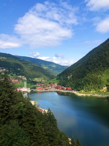 MG TURIZM a large body of water surrounded by mountains OF TRABZON