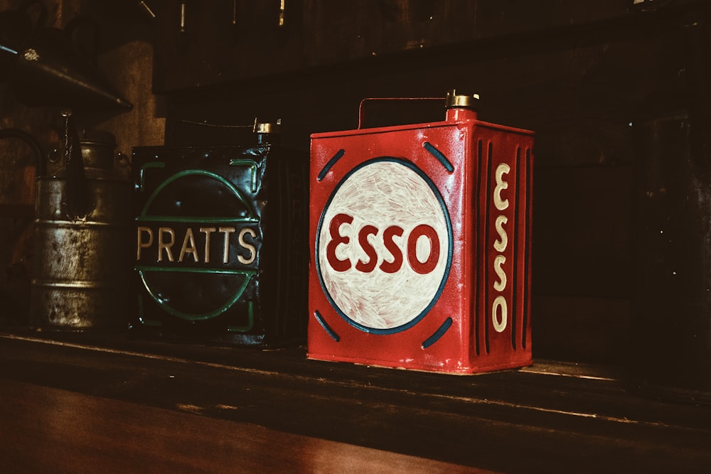 a couple of tin cans sitting on top of a shelf