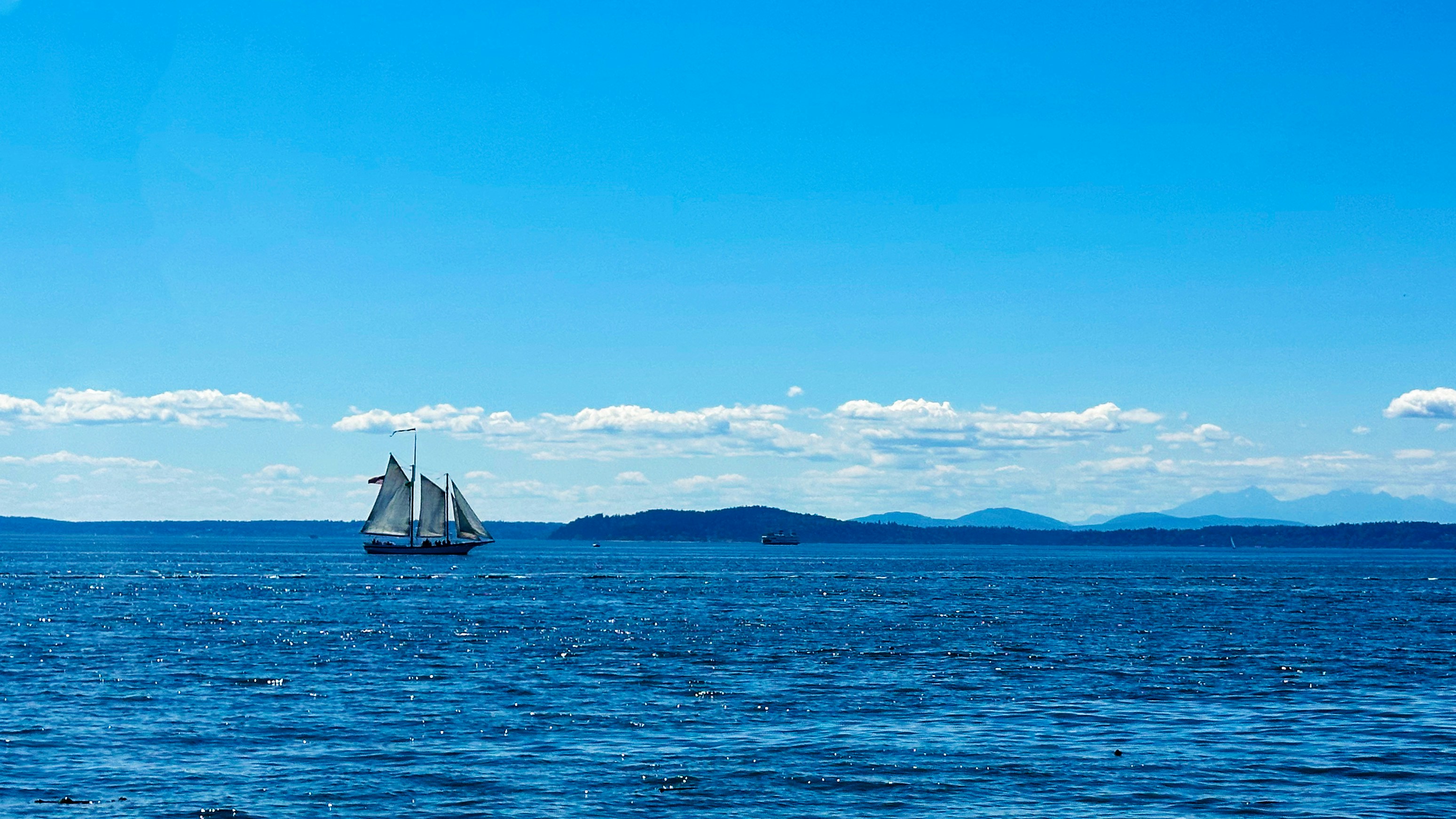 a sailboat in the middle of a large body of water