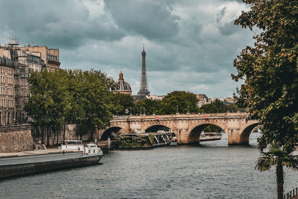 a view of a bridge over a river in paris