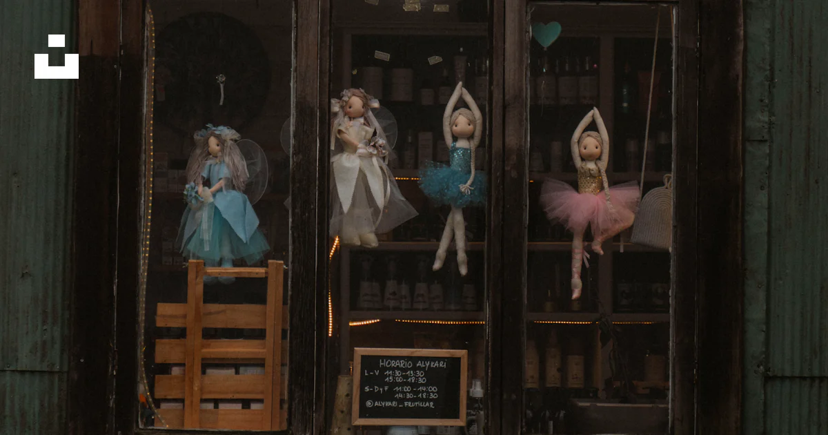 Puppet Touching Window A window that has a bunch of dolls in it photo – Free Frutillar Image ...