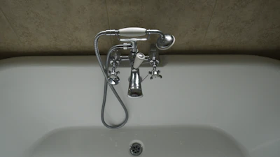 Close-up of a walk-in tub faucet and control panel showcasing easy-to-use features.