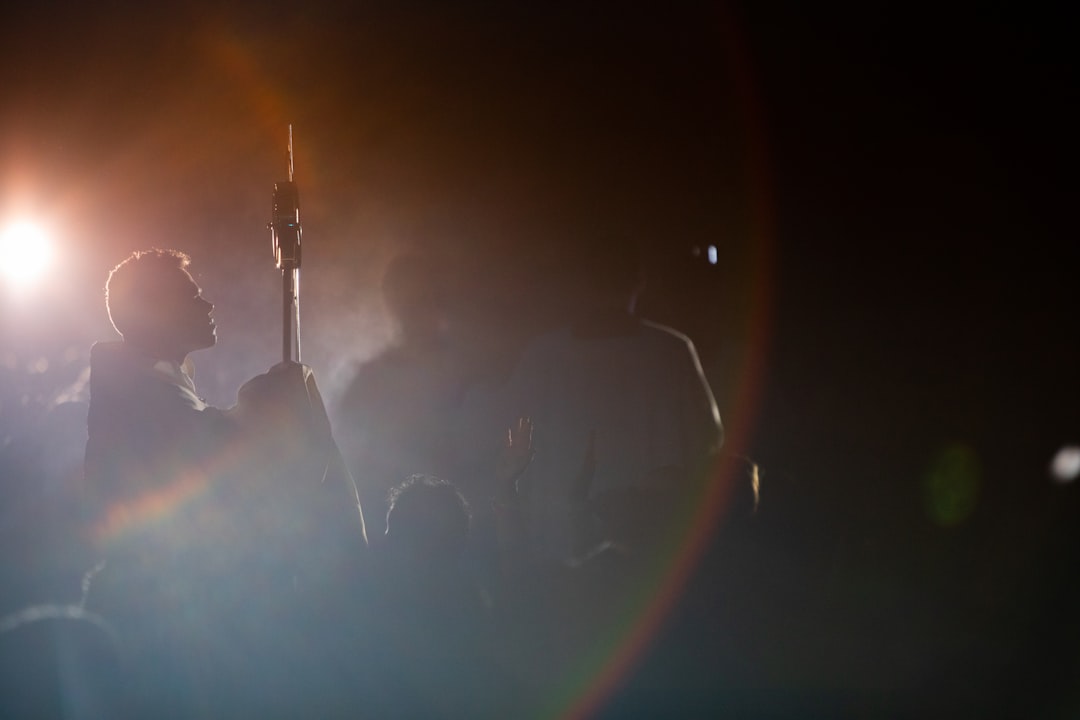 a group of people standing next to each other,