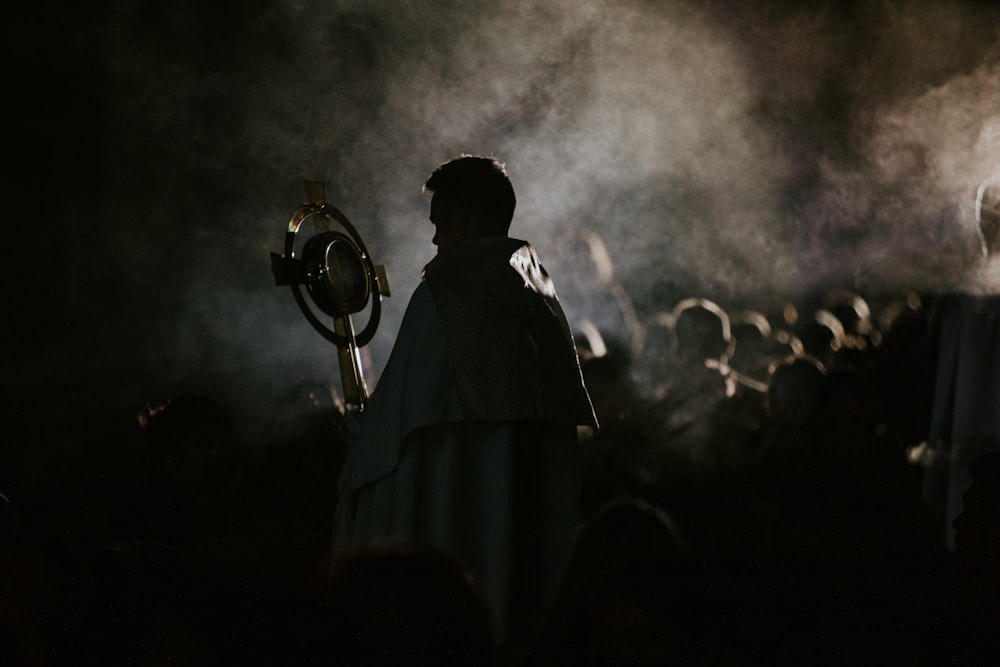 a man standing in front of a crowd of people