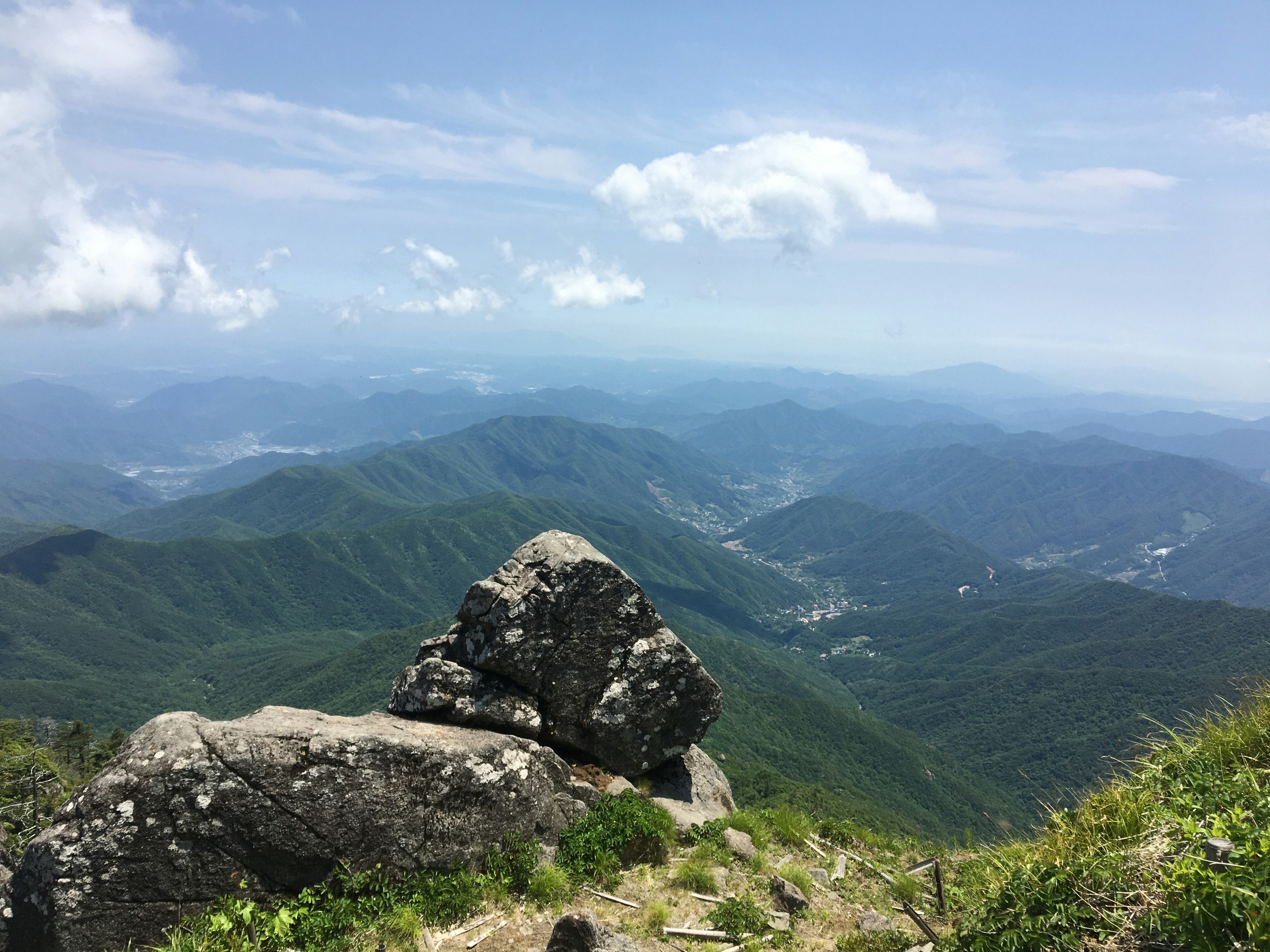a large rock on top of a mountain