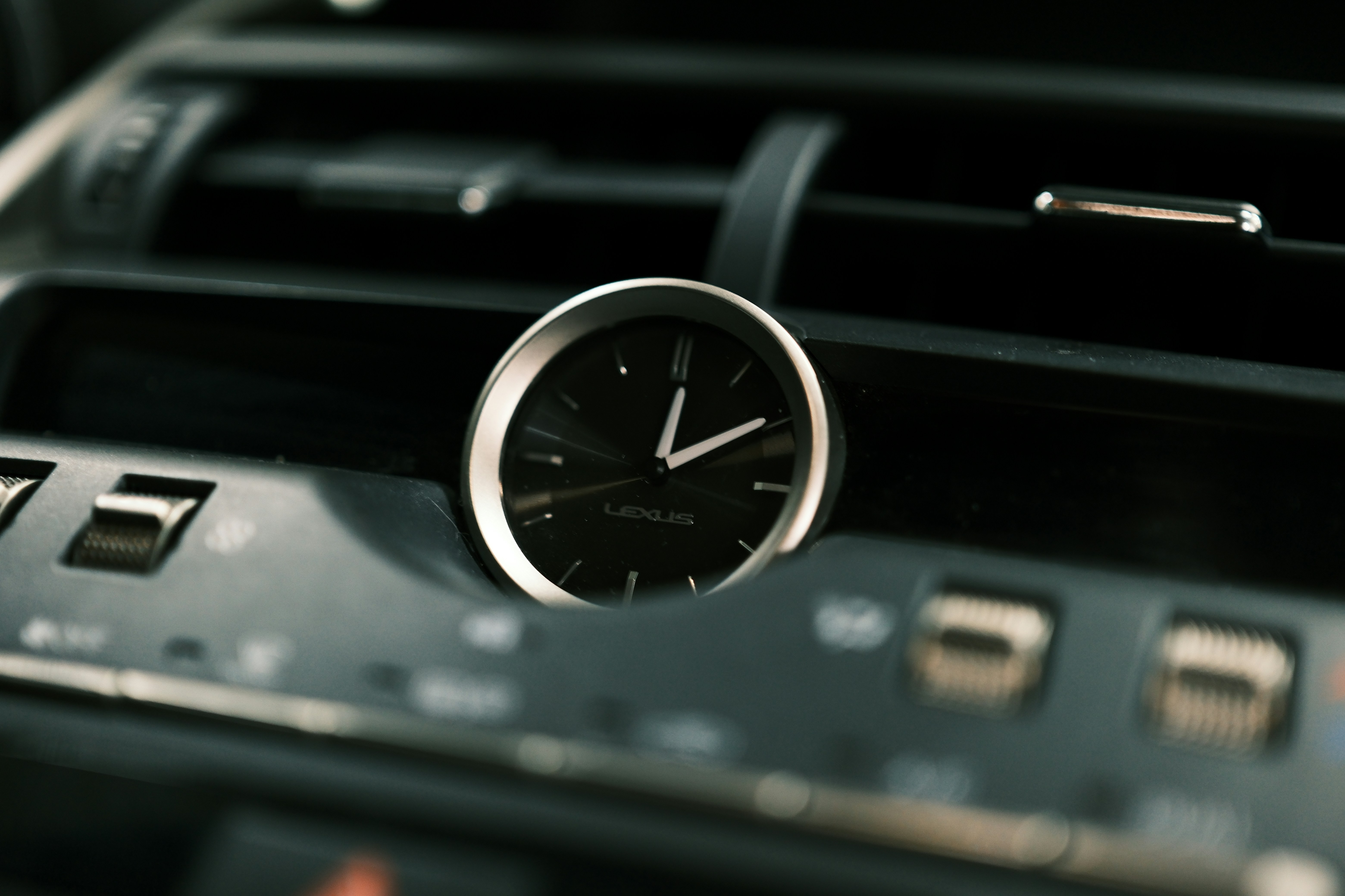 A close up of a clock in a car photo Free Car Image on Unsplash
