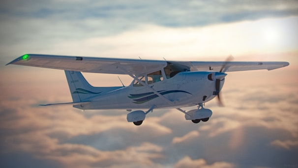 a small airplane flying through a cloudy sky