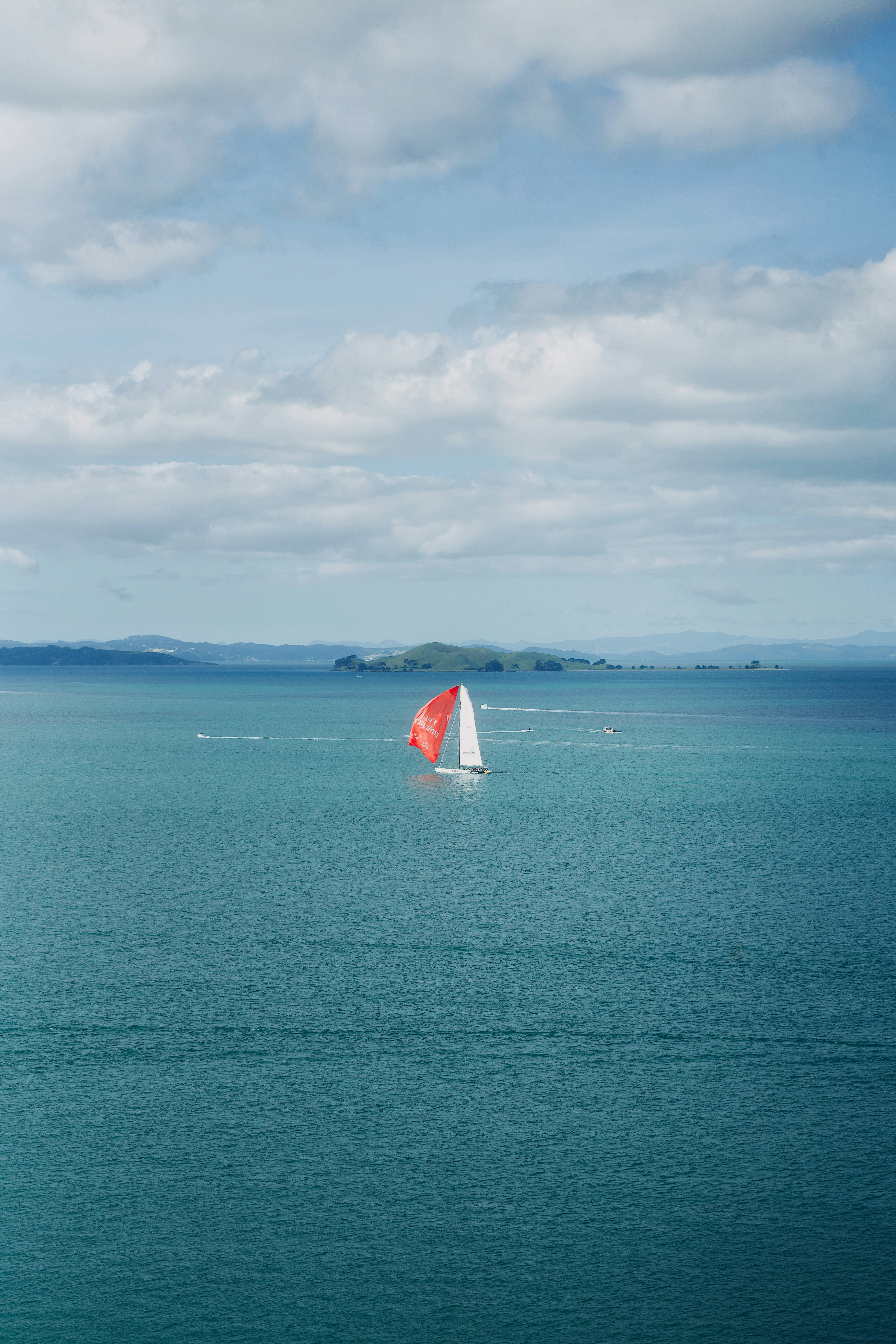 a sailboat in the middle of a large body of water