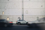 Minimalist illustration of a car with margin calculations floating around.