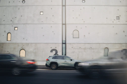Minimalist illustration of a car with margin calculations floating around.
