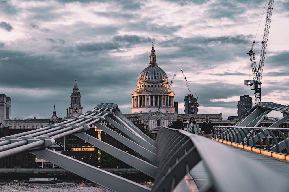 a view of a bridge with a building in the background