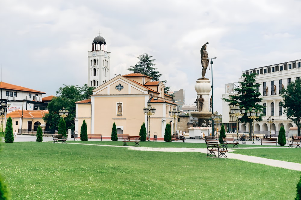 a building with a statue of a man on top of it