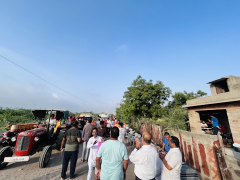 Local farmers sharing knowledge at a community gathering.