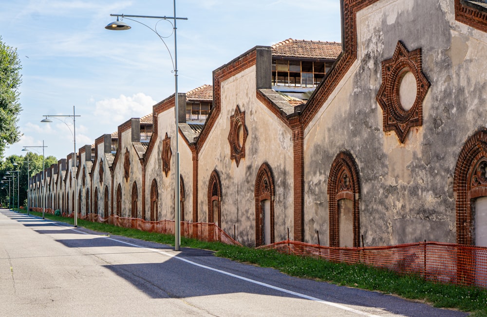 a row of old buildings along a street