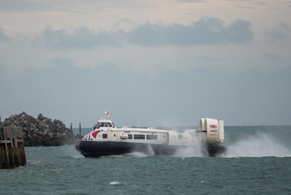 a large boat traveling across a body of water