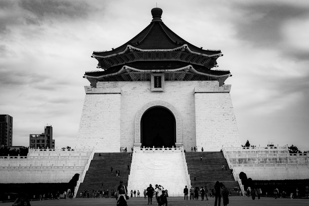 a black and white photo of a tall building