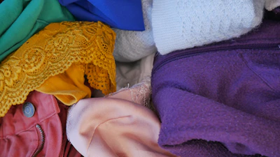 A vibrant pile of recycled textiles ready to be transformed into new products.