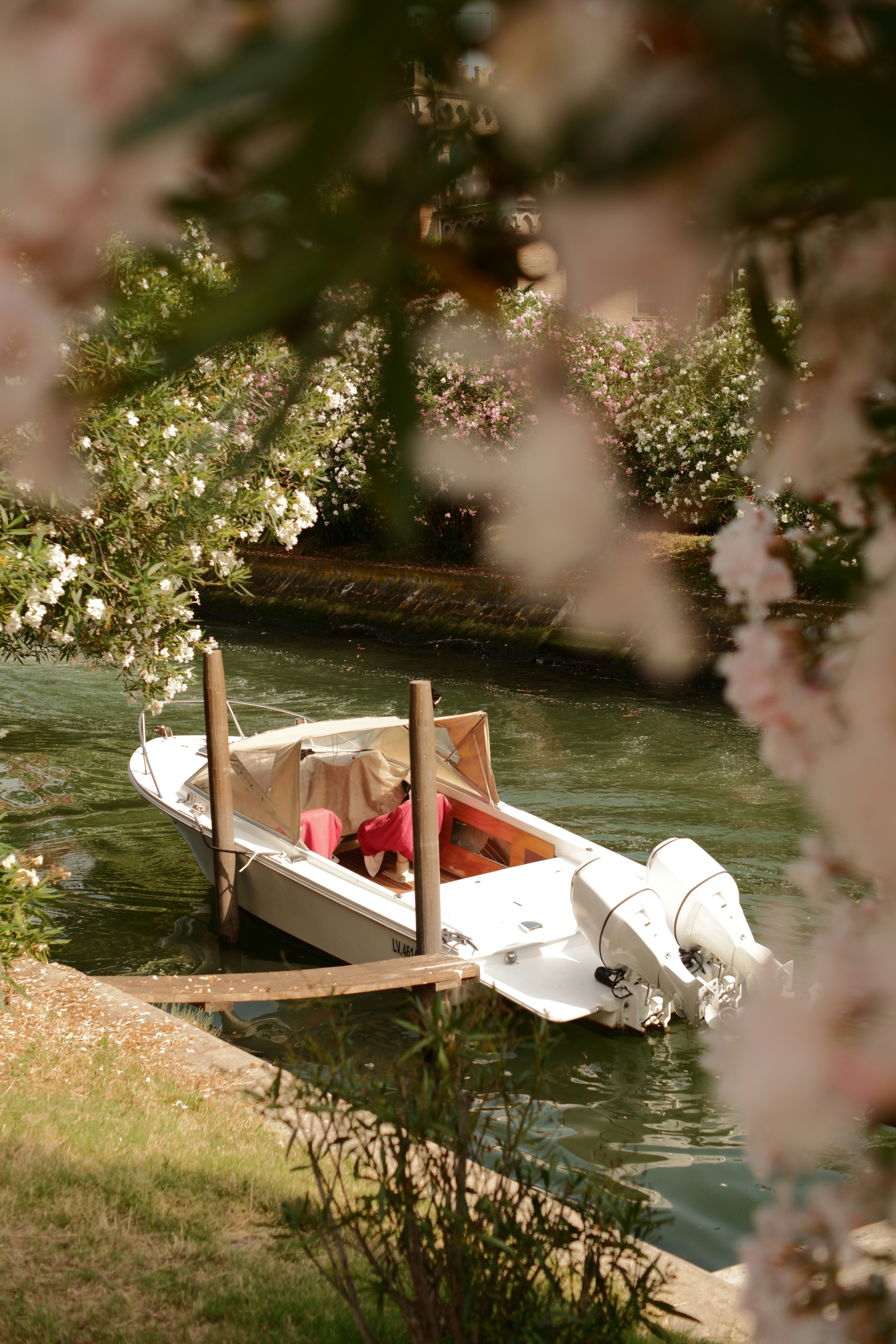 a small boat floating on top of a river