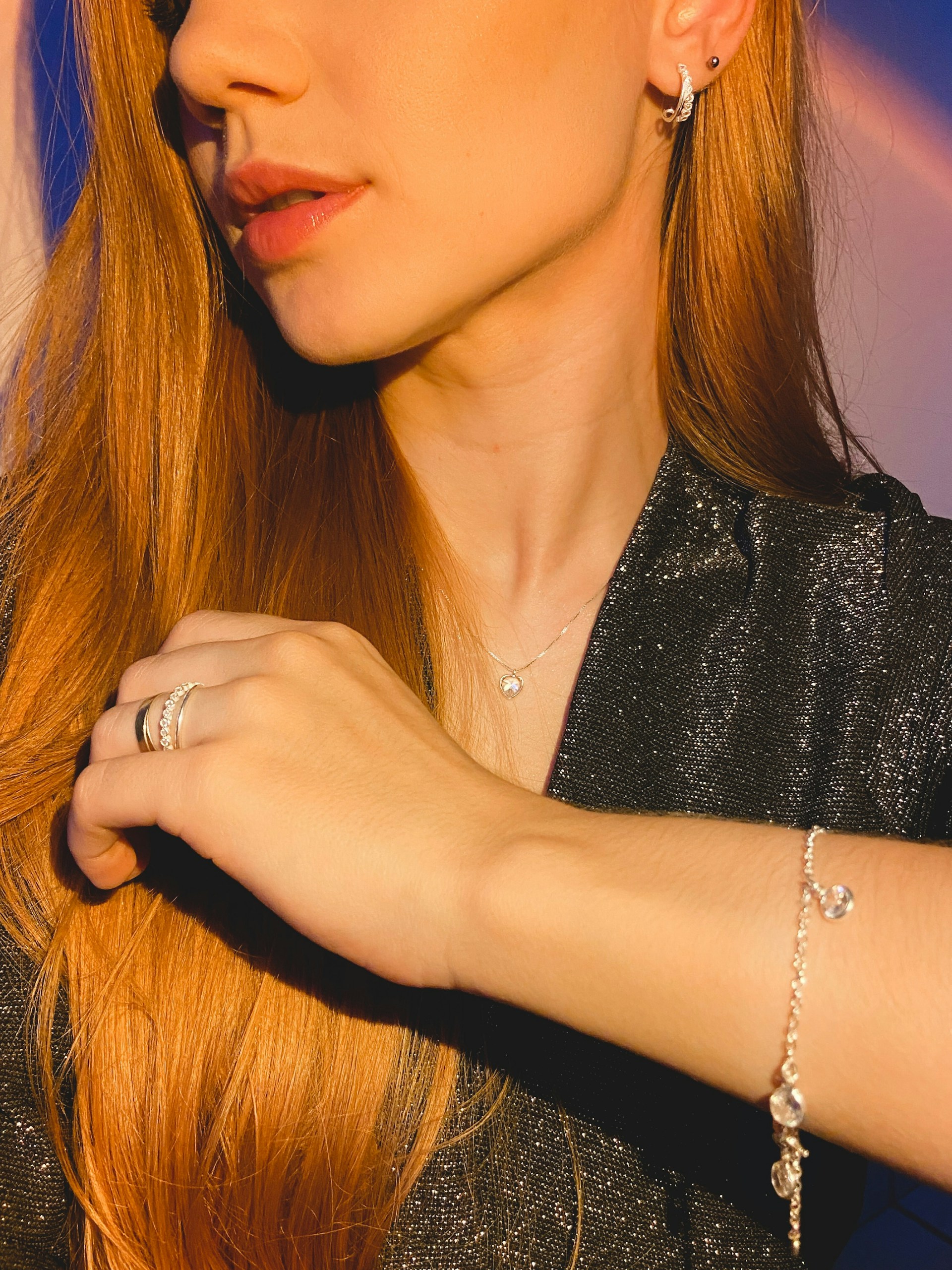 a close up of a person wearing a bracelet