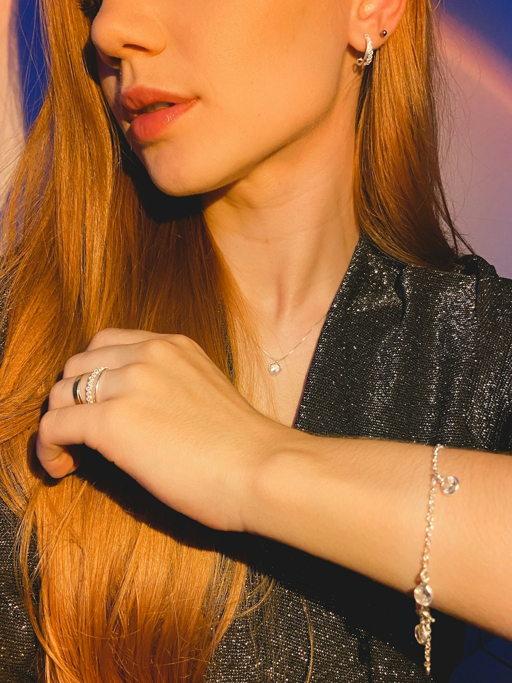 a close up of a person wearing a bracelet