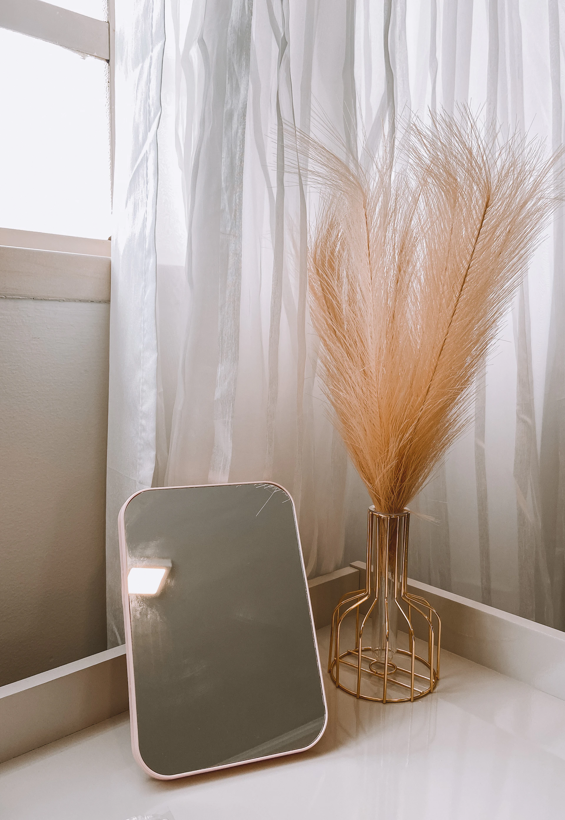 woman wearing yellow long-sleeved dress under white clouds and blue sky during daytime