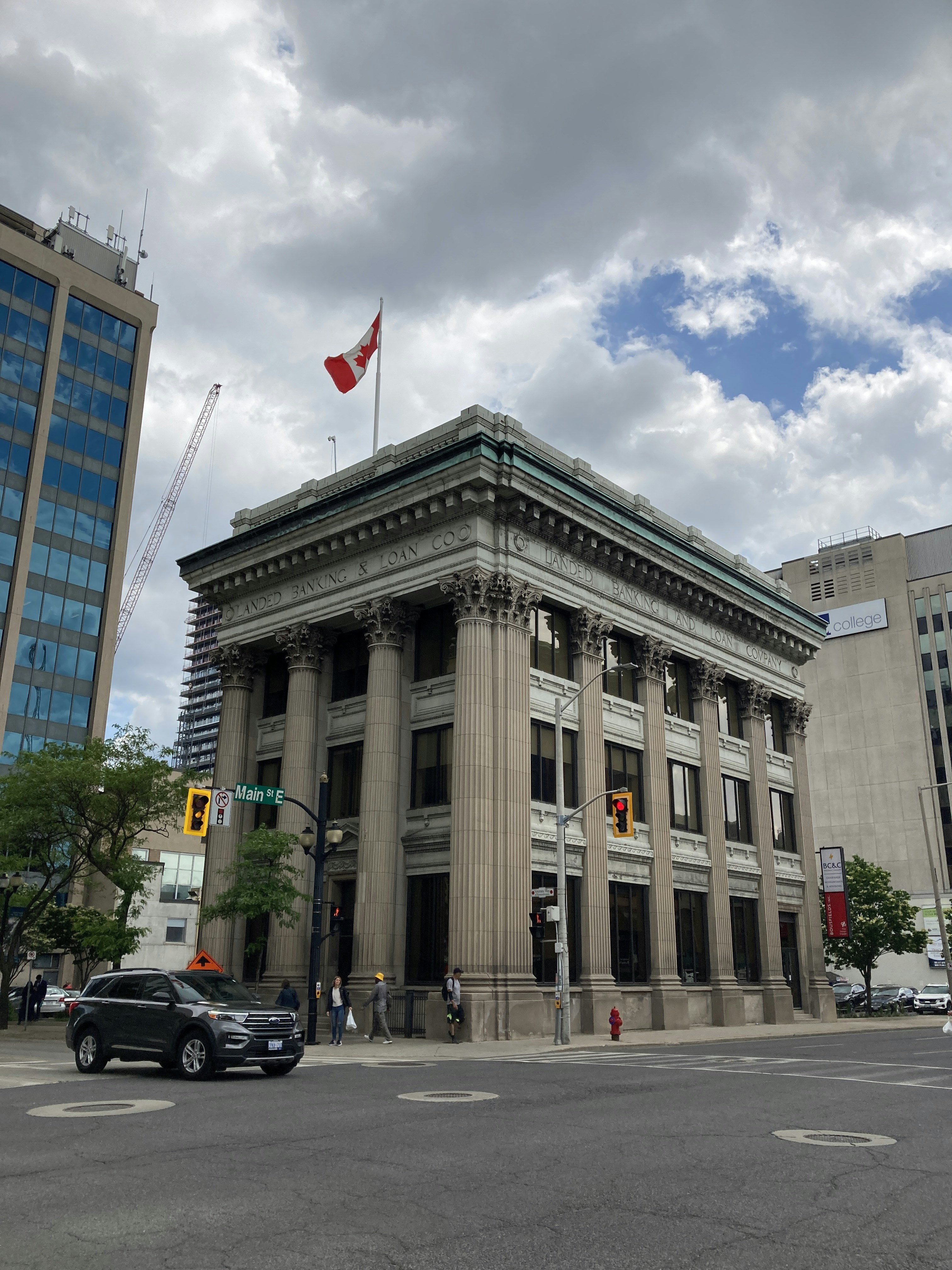 a large building with a flag on top of it